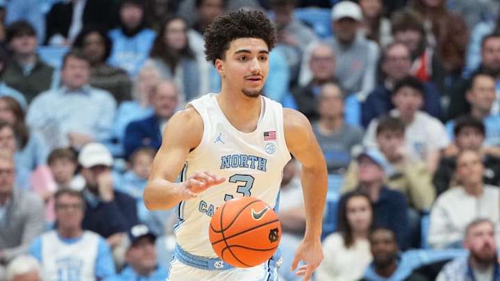 Feb 2, 2026; Chapel Hill, North Carolina, USA; North Carolina Tar Heels guard Derek Dixon (3) with the ball in the second half at Dean E. Smith Center. Mandatory Credit: Bob Donnan-Imagn Images