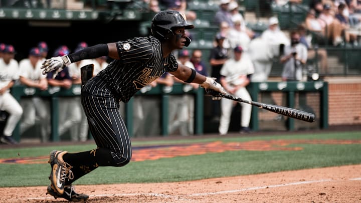 Vanderbilt outfielder RJ Austin begins his run to first base during the Commodores' big five-run, fifth inning against Auburn on Saturday.