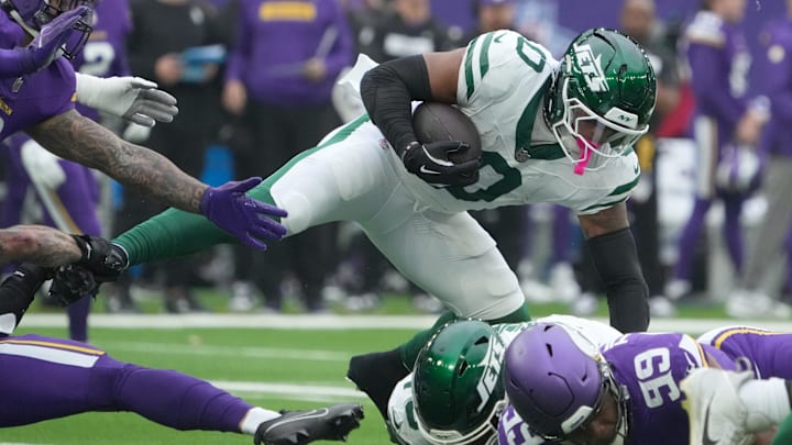 Oct 6, 2024; London, United Kingdom; New York Jets running back Braelon Allen (0) carries the ball against the Minnesota Vikings in the first half at Tottenham Hotspur Stadium. 