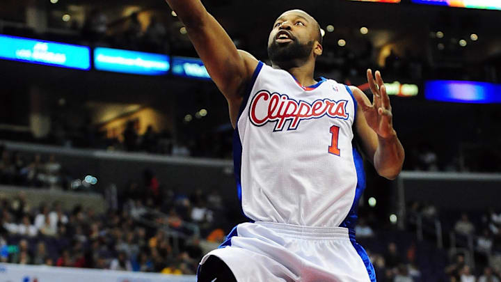 March 28, 2010; Los Angeles, CA, USA; Los Angeles Clippers guard Baron Davis (1) scores against the Golden State Warriors during the first half at the Staples Center. Mandatory Credit: Gary A. Vasquez-Imagn Images