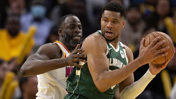Mar 18, 2025; San Francisco, California, USA; Milwaukee Bucks forward Giannis Antetokounmpo (34) attempts to turn and shoot over Golden State Warriors forward Draymond Green (left) during the fourth quarter at Chase Center. Mandatory Credit: D. Ross Cameron-Imagn Images Mar 18, 2025; San Francisco, California, USA; Milwaukee Bucks forward Giannis Antetokounmpo (34) attempts to turn and shoot over Golden State Warriors forward Draymond Green (left) during the fourth quarter at Chase Center. Mandatory Credit: D. Ross Cameron-Imagn Images
