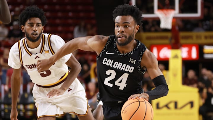 Jan 3, 2026; Tempe, Arizona, USA; Colorado Buffaloes guard Barrington Hargress (24) against Arizona State Sun Devils guard Maurice Odum (5) in the first half at Desert Financial Arena. Mandatory Credit: Mark J. Rebilas-Imagn Images