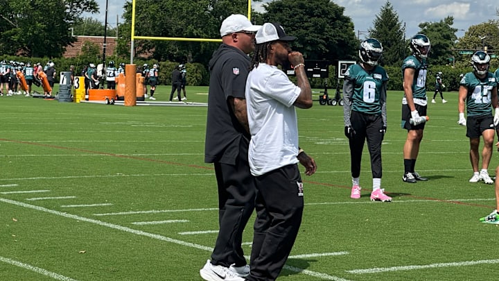 DeSean Jackson (right) discusses things with Eagles head of security Big Dom during the team's minicamp on June 10, 2025. DeSean Jackson (right) discusses things with Eagles head of security Big Dom during the team's minicamp on June 10, 2025.