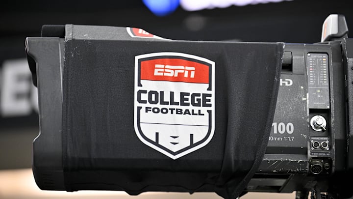 Dec 6, 2025; Arlington, TX, USA; A view of a tv camera and the ESPN college football logo before the game between the Texas Tech Red Raiders and the BYU Cougars at AT&T Stadium. Mandatory Credit: Jerome Miron-Imagn Images