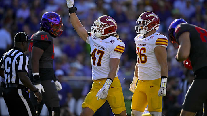 Nov 8, 2025; Fort Worth, Texas, USA; Iowa State Cyclones linebacker Kooper Ebel (47) and linebacker Caleb Bacon (26) celebrates a defensive stop against the TCU Horned Frogs during the first half at Amon G. Carter Stadium. Mandatory Credit: Jerome Miron-Imagn Images
