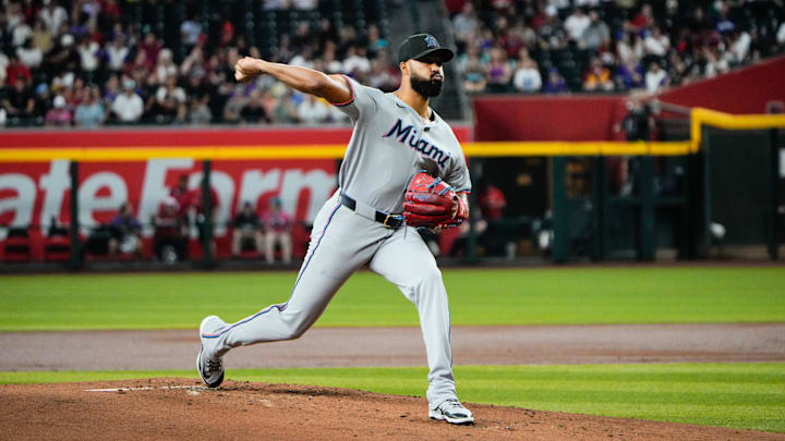 Jun 28, 2025; Phoenix, Arizona, USA; Miami Marlins starting pitcher Sandy Alcantara (22) delivers a pitch in the first inning against the Arizona Diamondbacks at Chase Field. Mandatory Credit: Arianna Grainey-Imagn Images
