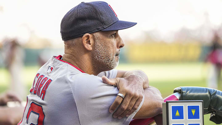 Boston Red Sox manager Alex Cora (13) in the dugout against the Atlanta Braves during the first inning at Truist Park.