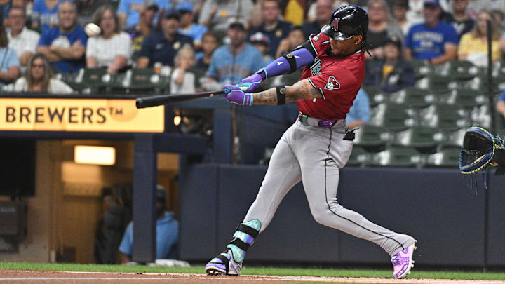 Sep 20, 2024; Milwaukee, Wisconsin, USA; Arizona Diamondbacks second base Ketel Marte (4) hits a home run against the Milwaukee Brewers in the first inning at American Family Field. Mandatory Credit: Michael McLoone-Imagn Images