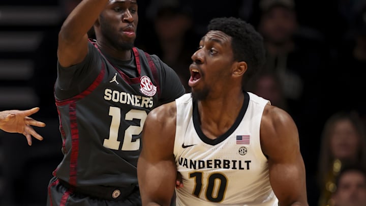 Feb 7, 2026; Nashville, Tennessee, USA;  Vanderbilt Commodores forward Ak Okereke (10) backs down Oklahoma Sooners guard Jadon Jones (12) during the first half at Memorial Gymnasium. Mandatory Credit: Steve Roberts-Imagn Images