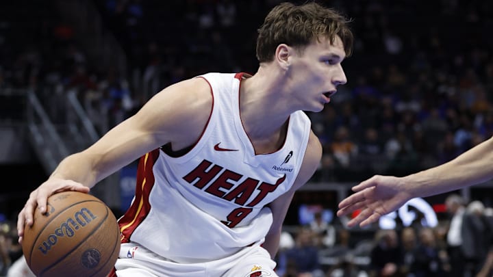 Nov 12, 2024; Detroit, Michigan, USA; Miami Heat guard Pelle Larsson (9) dribbles defended by Detroit Pistons forward Simone Fontecchio (19) in the first half at Little Caesars Arena. Mandatory Credit: Rick Osentoski-Imagn Images Nov 12, 2024; Detroit, Michigan, USA; Miami Heat guard Pelle Larsson (9) dribbles defended by Detroit Pistons forward Simone Fontecchio (19) in the first half at Little Caesars Arena. Mandatory Credit: Rick Osentoski-Imagn Images