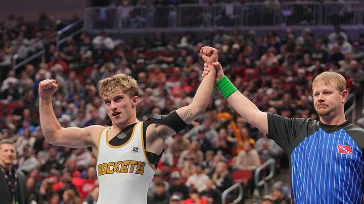 Landen Davis of Eddyville-Blakesburg-Fremont wrestles Owen Henriksen of Alburnett in the 144-pound championship match during the Class 2A finals of the Iowa high school state wrestling tournament at the Casey's Center in Des Moines, Feb. 21, 2026.