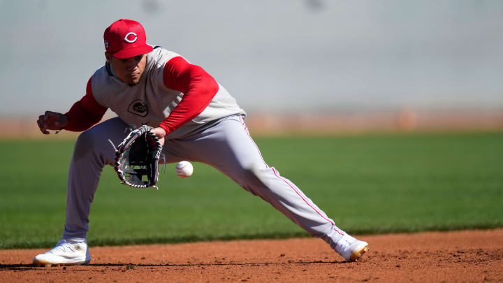 Feb 19, 2024; Goodyear, AZ, USA; Cincinnati Reds infielder Noelvi Marte fields a groundball during spring training workouts at Goodyear Ballpark.