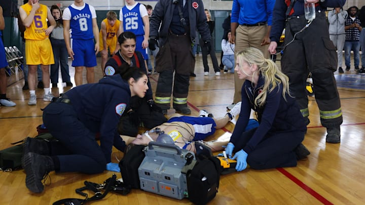 CHICAGO FIRE -- "On The Hook" Episode 12005 -- Pictured: (l-r) Hanako Greensmith as Violet Mikami, Miranda Rae Mayo as Stella Kidd, Christian Stolte as Randy "Mouch" McHolland, Kara Killmer as Sylvie Brett -- (Photo by: Adrian S Burrows Sr/NBC)