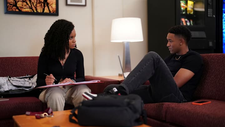 All American: Homecoming -- "Love and War" -- Image Number: AHC103fg_0060r.jpg -- Pictured (L-R): Geffri Maya as Simone Hicks and Peyton Alex Smith as Damon Sims -- Photo: The CW -- (C) 2022 The CW Network, LLC. All Rights Reserved.