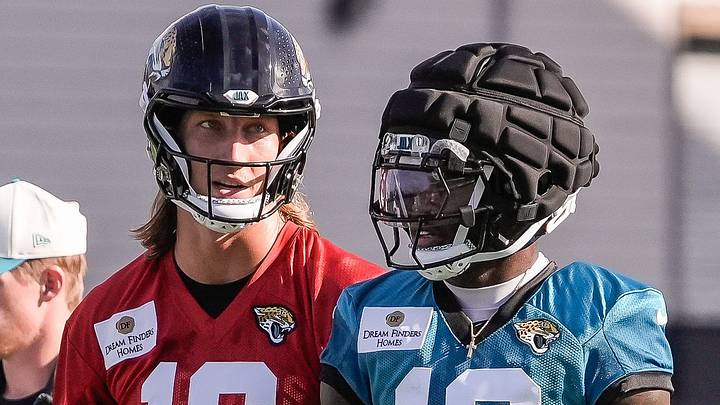 Jacksonville Jaguars Quarterback Trevor Lawrence (16) talks with Jacksonville Jaguars Cornerback/Wide Receiver Travis Hunter (12) after a pass play during the Jacksonville Jaguars 10th day of NFL Training Camp at the Miller Electric Center in Jacksonville, Fla., Sunday, August 9, 2026.    [Doug Engle/Florida Times-Union]