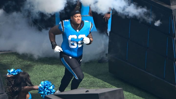 Sep 21, 2025; Charlotte, North Carolina, USA; Carolina Panthers guard Chandler Zavala (62) runs on to the field before the game at Bank of America Stadium. 