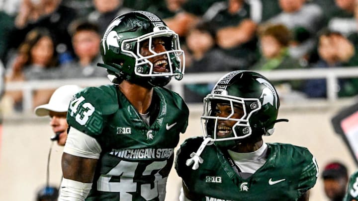 Michigan State's Malik Spencer, left, celebrates a stop with Charles Brantley during the first quarter in the game against Ohio State on Saturday, Sept. 28, 2024, at Spartan Stadium in East Lansing. Michigan State's Malik Spencer, left, celebrates a stop with Charles Brantley during the first quarter in the game against Ohio State on Saturday, Sept. 28, 2024, at Spartan Stadium in East Lansing.