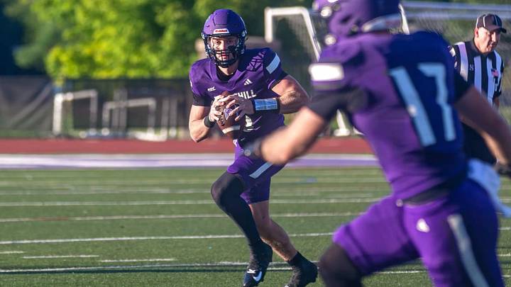 Stonehill quarterback Jack O'Connell (12) Stonehill quarterback Jack O'Connell (12)
