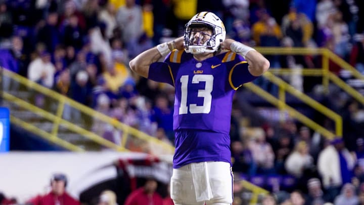 Nov 30, 2024; Baton Rouge, Louisiana, USA;  LSU Tigers quarterback Garrett Nussmeier (13) reacts to missing a pass against the Oklahoma Sooners during the fourth quarter at Tiger Stadium. Mandatory Credit: Stephen Lew-Imagn Images