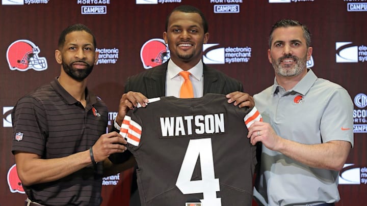 Cleveland Browns quarterback Deshaun Watson, center, poses for a portrait with general manager Andrew Berry, left, and coach Kevin Stefanski during Watson's introductory news conference on March 26, 2022, at the Browns training facility in Berea.