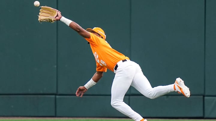 Tennessee's Jay Abernathy (8) dives to catch the ball during a NCAA baseball game between Tennessee and Kent State at Lindsey Nelson Stadium in Knoxville, Tenn., on Feb. 21, 2026. Tennessee's Jay Abernathy (8) dives to catch the ball during a NCAA baseball game between Tennessee and Kent State at Lindsey Nelson Stadium in Knoxville, Tenn., on Feb. 21, 2026.