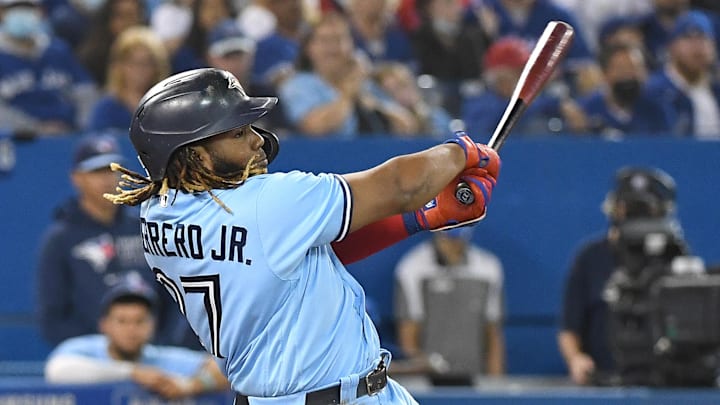 Toronto Blue Jays first baseman Vladimir Guererro Jr. (27) hits a two run home run against Baltimore Orioles in the second inning at Rogers Centre. Toronto Blue Jays first baseman Vladimir Guererro Jr. (27) hits a two run home run against Baltimore Orioles in the second inning at Rogers Centre.