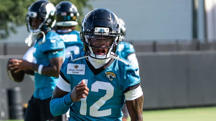 Jacksonville Jaguars wide receiver Travis Hunter (12) runs a passing drill during the Jacksonville Jaguars’ third mandatory minicamp Thursday June 12, 2025 at the Miller Electric Center in Jacksonville, Fla. [Doug Engle/Florida Times-Union]