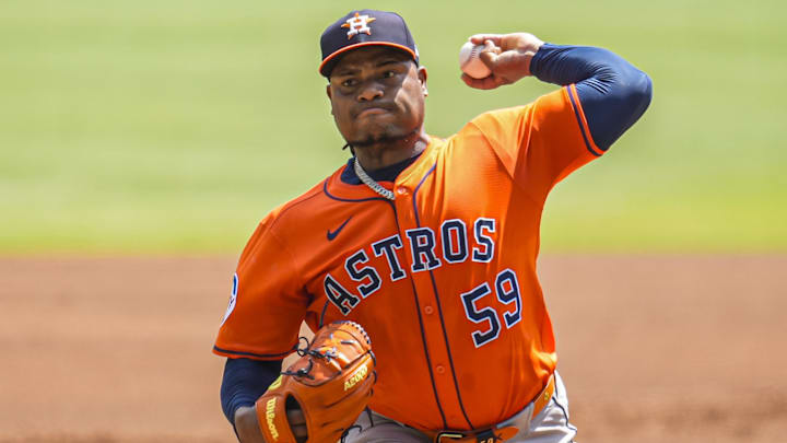 Sep 14, 2025; Cumberland, Georgia, USA; Houston Astros starting pitcher Framber Valdez (59) pitches against the Atlanta Braves during the first inning at Truist Park. Mandatory Credit: Dale Zanine-Imagn Images