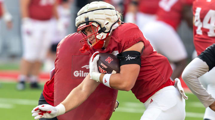 Nebraska tight end Carter Nelson runs through a block during a drill at the Big Red Preview on Saturday. Nebraska tight end Carter Nelson runs through a block during a drill at the Big Red Preview on Saturday.