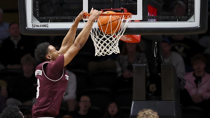 Feb 14, 2026; Nashville, Tennessee, USA; Texas A&M Aggies guard Rylan Griffen (3) dunks the ball against the Vanderbilt Commodores during the second half at Memorial Gymnasium. Mandatory Credit: Steve Roberts-Imagn Images