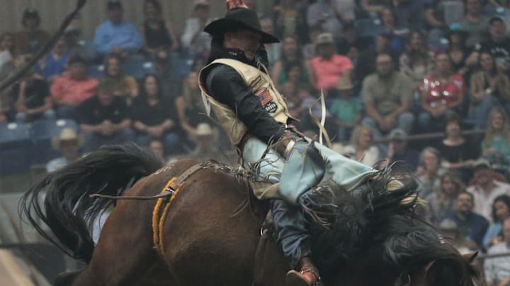 Keenan Hayes rides Night Crawler during the San Angelo Stock Show & Rodeo finals at the Foster Communications Coliseum on Friday, April 15, 2022.

Rodeo Finals Keenan Hayes Bareback Champ