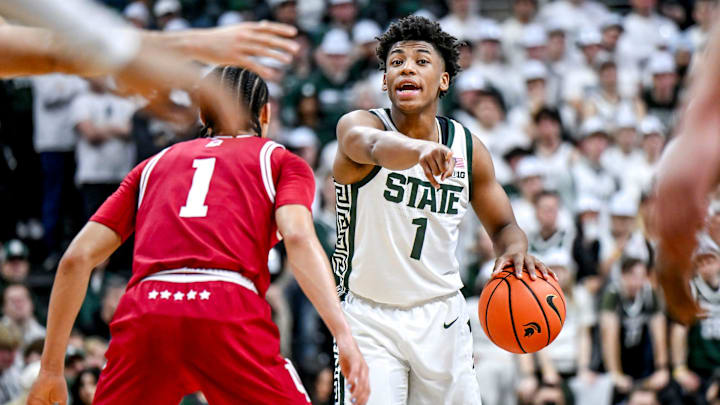 Michigan State's Jeremy Fears Jr., right, communicates with teammates as Indiana's Myles Rice, left, defends during the first half on Tuesday, Feb. 11, 2025, at the Breslin Center in East Lansing.