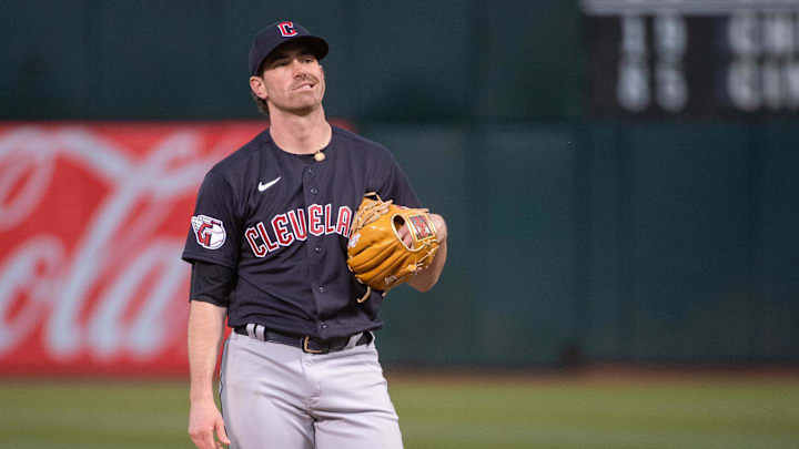 Apr 4, 2023; Oakland, California, USA; Cleveland Guardians starting pitcher Shane Bieber (57) reacts after throwing a pitch during the third inning of the game against the Oakland Athletics at RingCentral Coliseum.