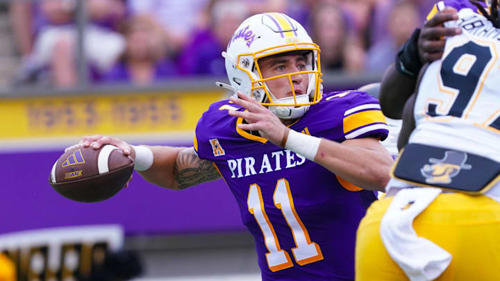 Sep 14, 2024; Greenville, North Carolina, USA;  East Carolina Pirates quarterback Jake Garcia (11) throws the ball against the Appalachian State Mountaineers during the first half at Dowdy-Ficklen Stadium. Mandatory Credit: James Guillory-Imagn Images