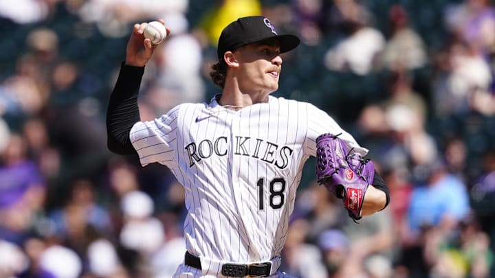 Apr 10, 2025; Denver, Colorado, USA;Colorado Rockies starting pitcher Ryan Feltner (18) delivers a pitch in the third inning against the Milwaukee Brewers at Coors Field. Mandatory Credit: Ron Chenoy-Imagn Images