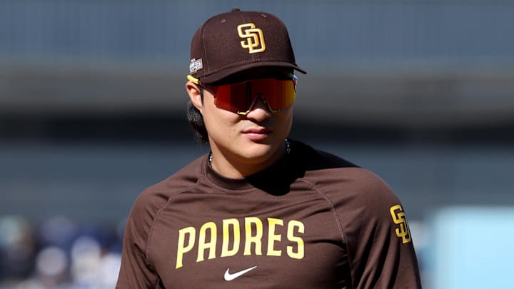 Oct 6, 2024; Los Angeles, California, USA; San Diego Padres shortstop Ha-Seong Kim (7) looks on during warm ups before game two against the Los Angeles Dodgers in the NLDS for the 2024 MLB Playoffs at Dodger Stadium. Mandatory Credit: Kiyoshi Mio-Imagn Images Oct 6, 2024; Los Angeles, California, USA; San Diego Padres shortstop Ha-Seong Kim (7) looks on during warm ups before game two against the Los Angeles Dodgers in the NLDS for the 2024 MLB Playoffs at Dodger Stadium. Mandatory Credit: Kiyoshi Mio-Imagn Images