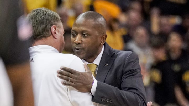 Dec 10, 2022; Columbia, Missouri, USA; Kansas Jayhawks head coach Bill Self, left, embraces Missouri Tigers head coach Dennis Gates after a game at Mizzou Arena. Mandatory Credit: Denny Medley-Imagn Images Dec 10, 2022; Columbia, Missouri, USA; Kansas Jayhawks head coach Bill Self, left, embraces Missouri Tigers head coach Dennis Gates after a game at Mizzou Arena. Mandatory Credit: Denny Medley-Imagn Images