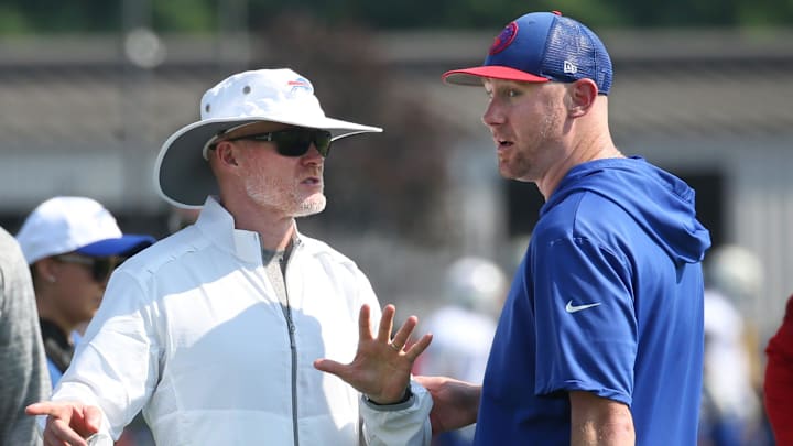 Bills head coach Sean McDermott talks with offensive coordinator Joe Brady during drills on the opening day of Buffalo Bills training camp at St. John Fisher University in Pittsford Wednesday, July 24, 2024.