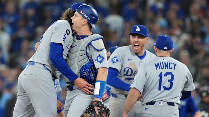 Los Angeles Dodgers pitcher Tyler Glasnow reacts with catcher Will Smith.