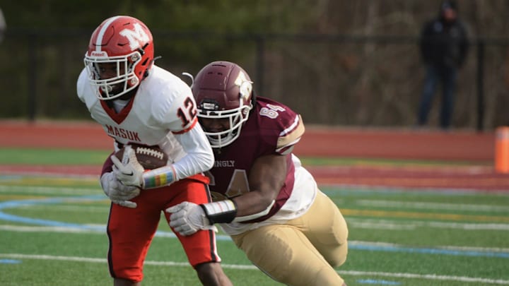 Killingly senior Terrence Allen makes the tackle against Masuk's Gavin Walker during the CIAC Class MM semifinal Sunday at Morgan Field.
Allen Killingly senior Terrence Allen makes the tackle against Masuk's Gavin Walker during the CIAC Class MM semifinal Sunday at Morgan Field.
Allen