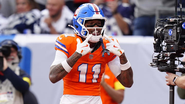 Oct 26, 2025; Denver, Colorado, USA; Denver Broncos wide receiver Troy Franklin (11) celebrates after scoring a touchdown against the Dallas Cowboys in the fourth quarter at Empower Field at Mile High. Mandatory Credit: Ron Chenoy-Imagn Images Oct 26, 2025; Denver, Colorado, USA; Denver Broncos wide receiver Troy Franklin (11) celebrates after scoring a touchdown against the Dallas Cowboys in the fourth quarter at Empower Field at Mile High. Mandatory Credit: Ron Chenoy-Imagn Images
