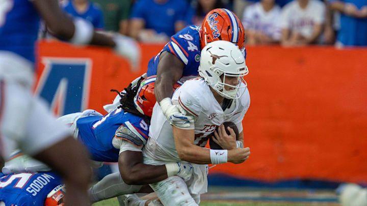 Florida Jamari Lyons takes down Texas quarterback Arch Manning (16) during the second half an NCAA football game in Gainesville, FL on Saturday, October 4, 2025. [Alan Youngblood/Gainesville Sun]