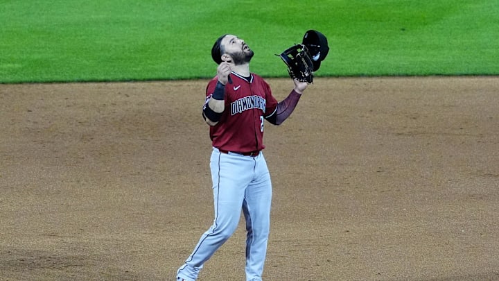 Denver, Colorado, USA; Arizona Diamondbacks third baseman Eugenio Suarez (28) celebrates the win against the Colorado Rockies at Coors Field.