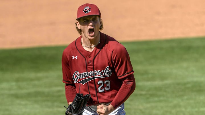 Mar 1, 2025; Greenville, South Carolina, USA; South Carolina Gamecocks pitcher Jake McCoy (23) reacts after striking out a batter against the Clemson Tigers during the top of the fourth inning at Fluor Field. Mandatory Credit: Ken Ruinard/USA Today Network via Imagn Images