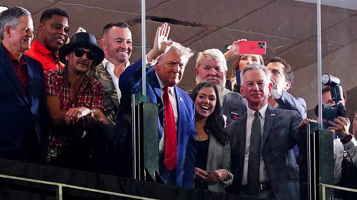 Sep 28, 2024; Tuscaloosa, Alabama, USA; GOP Presidential candidate Donald Trump waves flanked by former Georgia Bulldogs player Herschel Walker, recording art Kid Rock, professional golfer John Daily, Alabama senators Tommy Tuberville (R) and Katie Britt (R) during the second half of the game between the Alabama Crimson Tide and the Georgia Bulldogs at Bryant-Denny Stadium. Mandatory Credit: John David Mercer-Imagn Images Sep 28, 2024; Tuscaloosa, Alabama, USA; GOP Presidential candidate Donald Trump waves flanked by former Georgia Bulldogs player Herschel Walker, recording art Kid Rock, professional golfer John Daily, Alabama senators Tommy Tuberville (R) and Katie Britt (R) during the second half of the game between the Alabama Crimson Tide and the Georgia Bulldogs at Bryant-Denny Stadium. Mandatory Credit: John David Mercer-Imagn Images