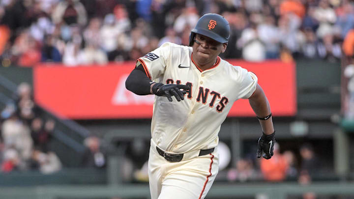 Jul 7, 2025; San Francisco, California, USA; San Francisco Giants designated hitter Rafael Devers (16) runs to third base during the third inning of the game against the Philadelphia Phillies at Oracle Park. Mandatory Credit: Ed Szczepanski-Imagn Images