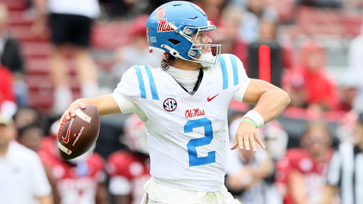 Nov 2, 2024; Fayetteville, Arkansas, USA; Ole Miss Rebels quarterback Jaxson Dart (2) passes in the fourth quarter against the Arkansas Razorbacks at Donald W. Reynolds Razorback Stadium. Mississippi won 63-31. Mandatory Credit: Nelson Chenault-Imagn Images Nov 2, 2024; Fayetteville, Arkansas, USA; Ole Miss Rebels quarterback Jaxson Dart (2) passes in the fourth quarter against the Arkansas Razorbacks at Donald W. Reynolds Razorback Stadium. Mississippi won 63-31. Mandatory Credit: Nelson Chenault-Imagn Images