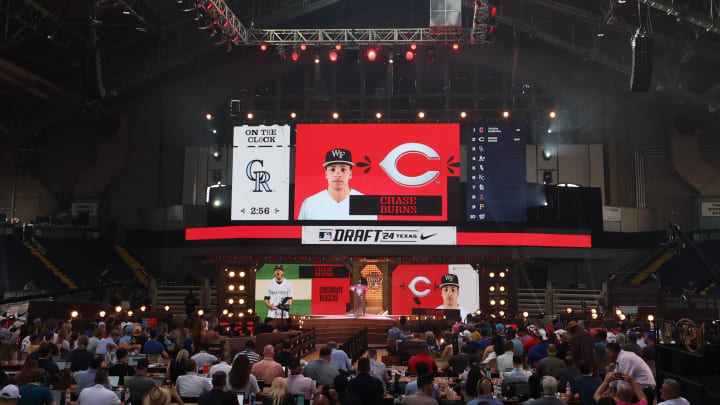 Jul 14, 2024; Ft. Worth, TX, USA; The Cincinnati Reds select Chase Burns with the second pick during the first round of the MLB Draft at Cowtown Coliseum. Mandatory Credit: Kevin Jairaj-USA TODAY Sports Jul 14, 2024; Ft. Worth, TX, USA; The Cincinnati Reds select Chase Burns with the second pick during the first round of the MLB Draft at Cowtown Coliseum. Mandatory Credit: Kevin Jairaj-USA TODAY Sports