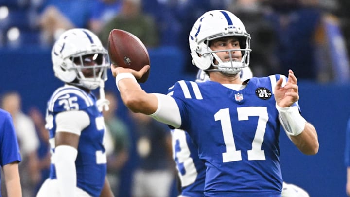 Indianapolis Colts quarterback Daniel Jones (17) throws a pass during warmups prior to the game against the Green Bay Packers at Lucas Oil Stadium.