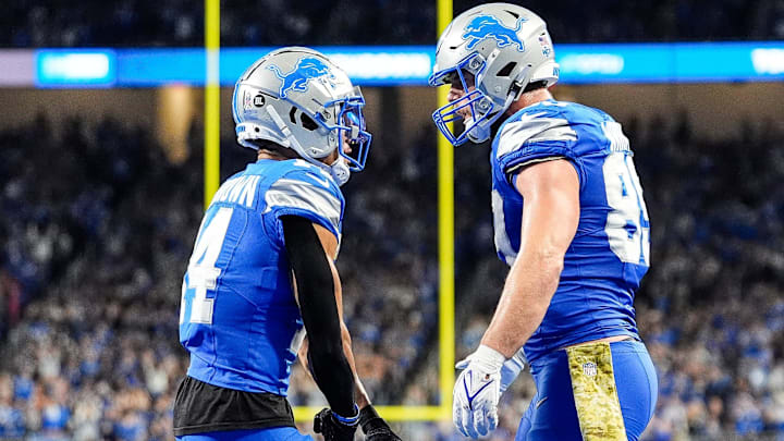 Detroit Lions tight end Brock Wright (89) celebrates a touchdown against Jacksonville Jaguars with wide receiver Amon-Ra St. Brown (14) during the second half at Ford Field in Detroit on Sunday, Nov. 17, 2024.